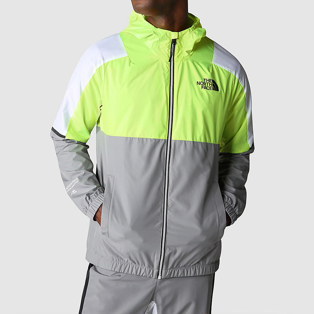 The North Face M Mountain Athletics Wind Full Zip Jacket Herren Meld Grey LED Yellow TNF White